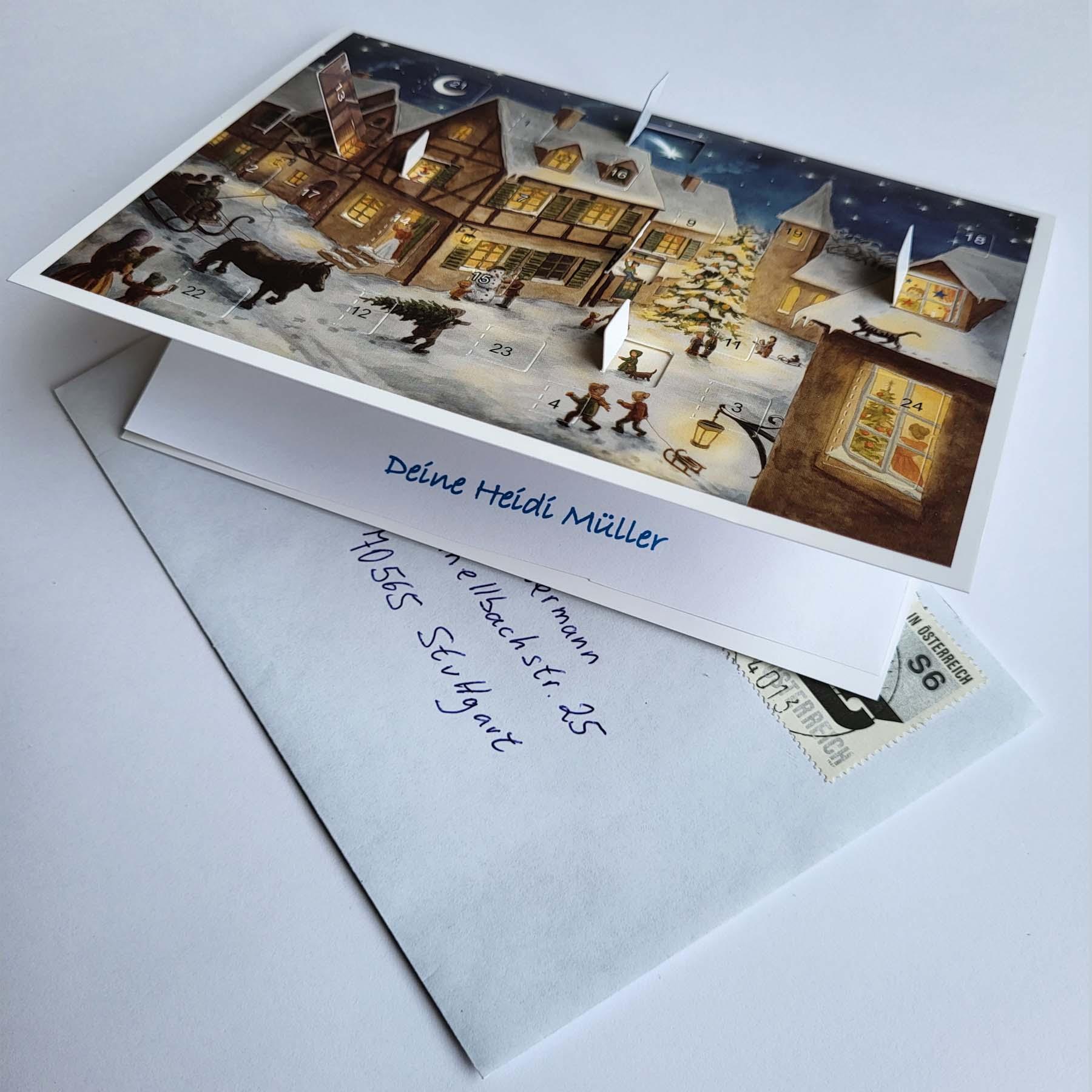 sellmer-verlag-postkarten-adventskalender-weihnachtsabend-im-dorf-querformat image 2